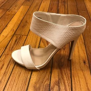 White faux snakeskin heels